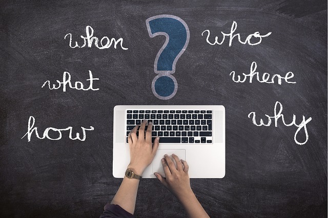 blogging critical questions on laptop
